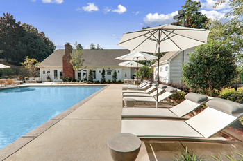 Poolside Lounge Area at Caveness Farms Apartments, Wake Forest 